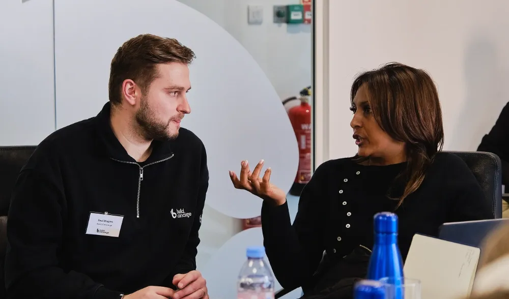 A Build Concierge employee with a customer